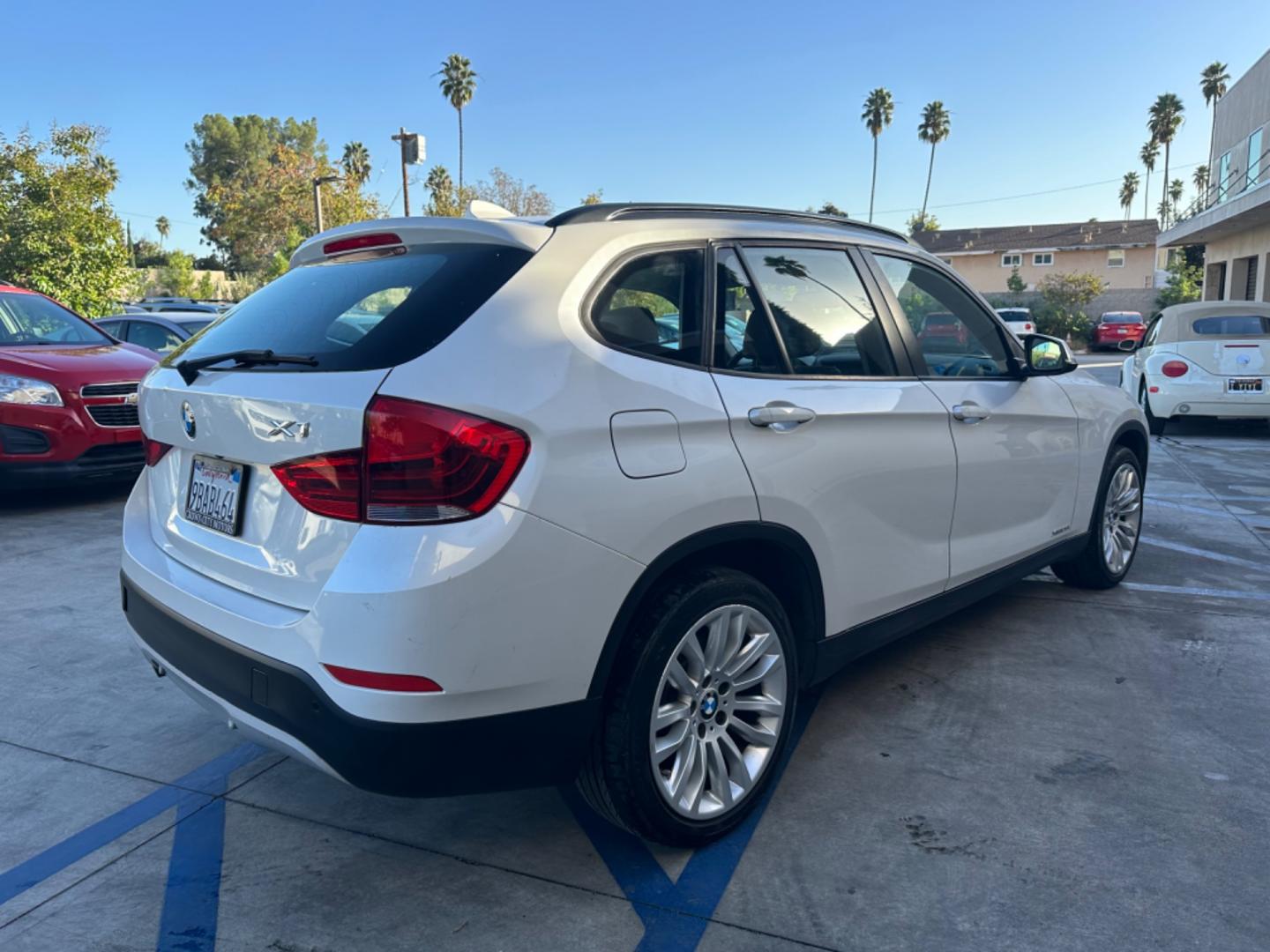 2014 WHITE /Black BMW X1 Leather (WBAVL1C56EV) with an 4 Cylinders engine, AUTOMATIC transmission, located at 30 S. Berkeley Avenue, Pasadena, CA, 91107, (626) 248-7567, 34.145447, -118.109398 - Don't let bad credit or financial setbacks hold you back from owning a luxury SUV like the 2014 BMW X1 xDrive28i. At our BHPH dealership, we're here to make the car-buying process as smooth and stress-free as possible. We invite you to visit our dealership in Pasadena, CA, to explore our inventory o - Photo#4